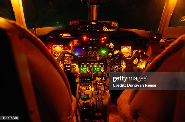 jet airplane cockpit at night - reese stockfoto's en -beelden