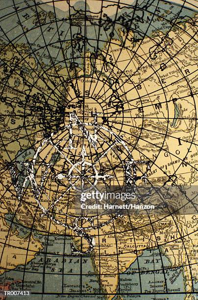 compass rose on a detail of a world map - zone géographique historique photos et images de collection