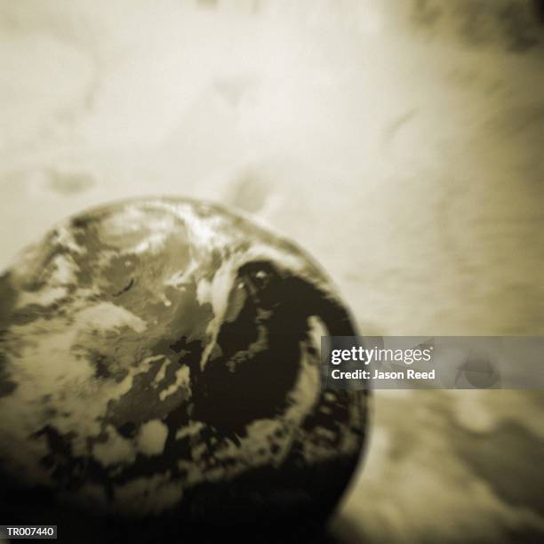 globe superimposed on a map - kleurcorrectie stockfoto's en -beelden