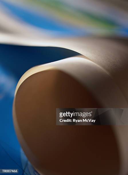 detail of a rolled up map - ryan stock pictures, royalty-free photos & images