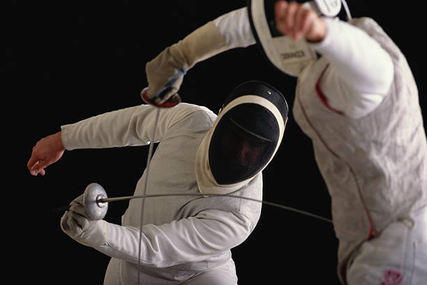 fencing, competitors in action - fencing - sport stock pictures, royalty-free photos & images