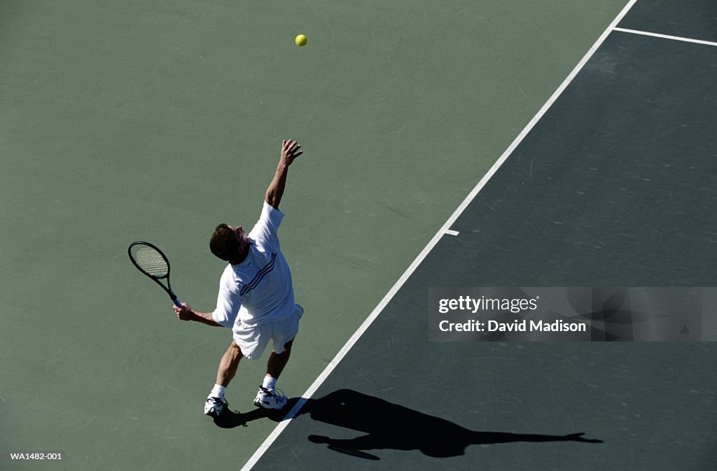 Tennis player serving