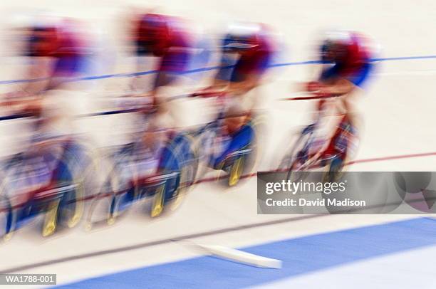 speed cycling at velodrome - track cycling stock pictures, royalty-free photos & images