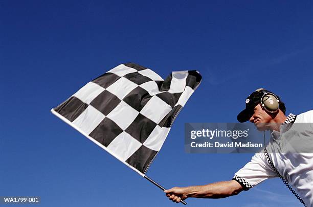 chequered flag - checkered race flag stockfoto's en -beelden