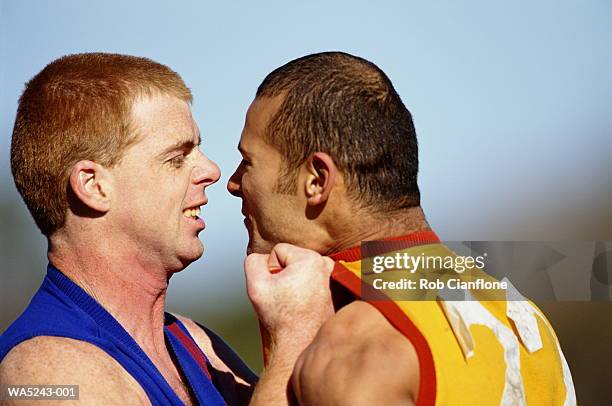 australia rules football players arguing - cianflone stock pictures, royalty-free photos & images