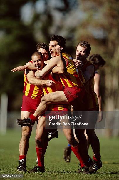 australia rules football players celebrating - cianflone stock pictures, royalty-free photos & images