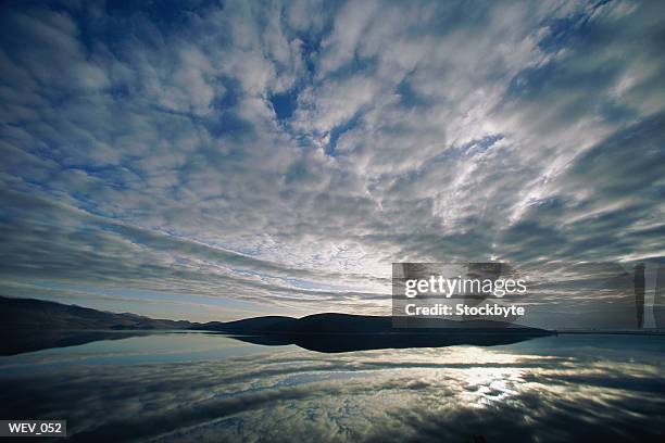 lake at sunrise - martin schulz gives statement as possibility of grand coalition grows stockfoto's en -beelden