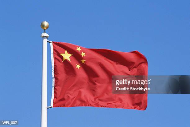flag of people's republic of china - stars of formula one and music make a noise at abbey road studios to help children locked away in orphanages stockfoto's en -beelden