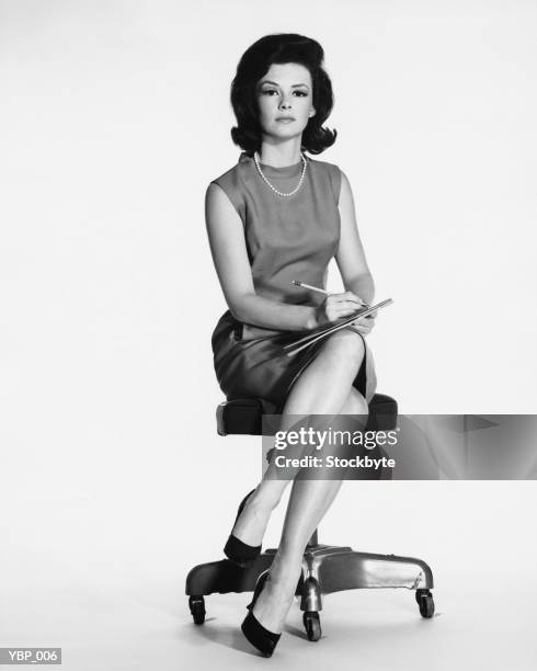 woman sitting, taking notes - sekreterare bildbanksfoton och bilder
