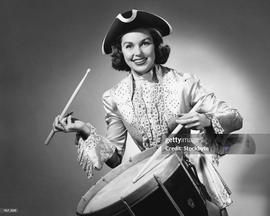 Woman dressed as drummer from American Revolution