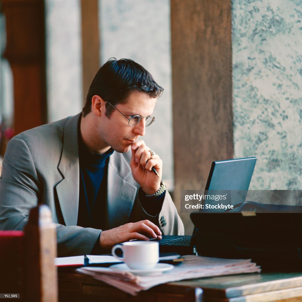 Businessman working in restaurant