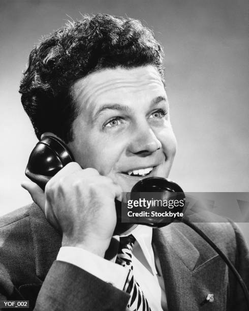 man talking on phone - only mid adult men stock pictures, royalty-free photos & images