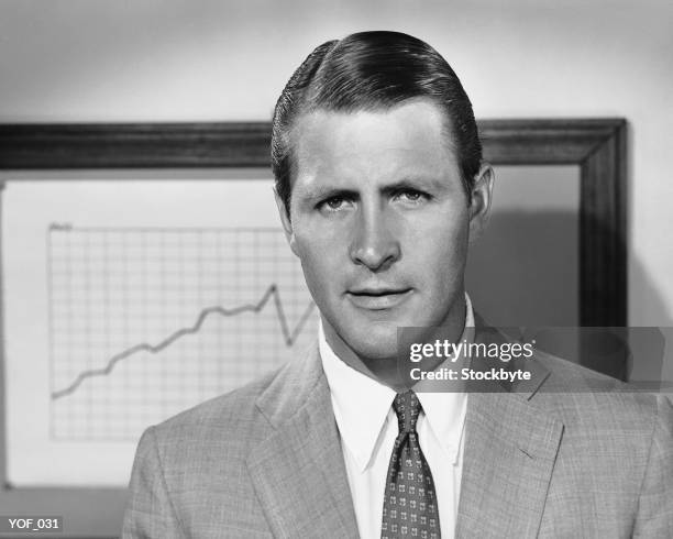 man in front of graph - of stockfoto's en -beelden