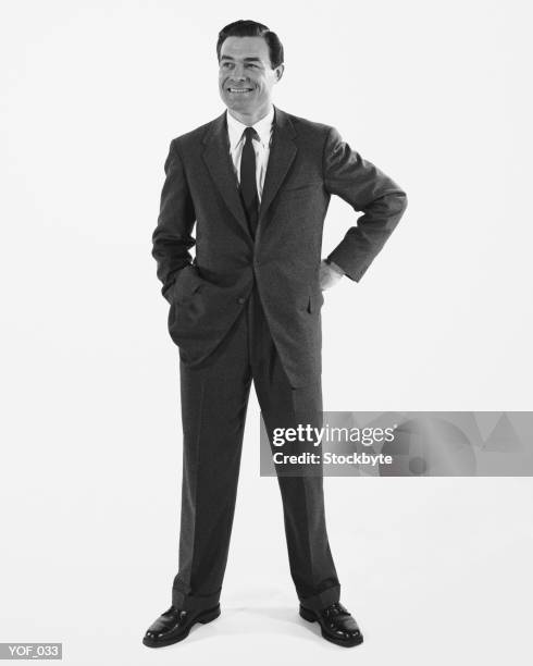 man standing, smiling - alleen oudere mannen stockfoto's en -beelden