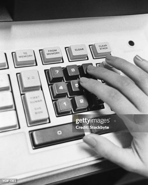 hand using adding machine - using stock pictures, royalty-free photos & images