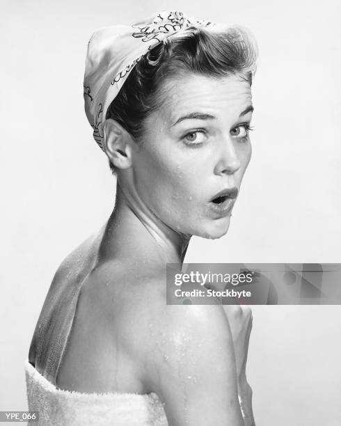 woman wrapped in towel, looking surprised - in stock pictures, royalty-free photos & images