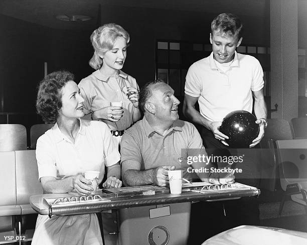 family at bowling alley - 1950s couple stock pictures, royalty-free photos & images