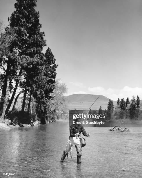 man fly-fishing in stream - s marvels agents of s h i e l d season four stockfoto's en -beelden