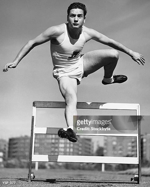 man jumping hurdle - no perfection stock pictures, royalty-free photos & images