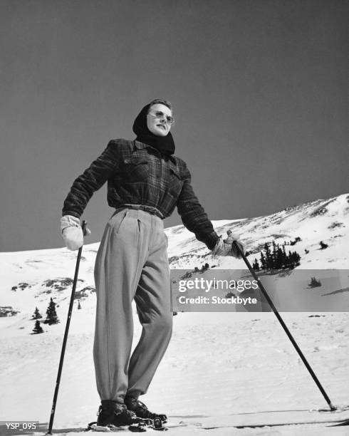 woman skier standing on slopes - not looking at camera stock pictures, royalty-free photos & images