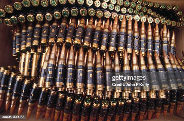 machine gun ammunition - ammunition stock pictures, royalty-free photos & images