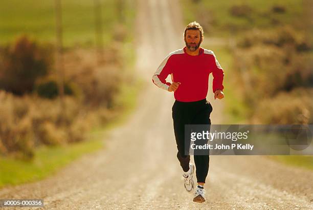 man running - distance running ストックフォトと画像