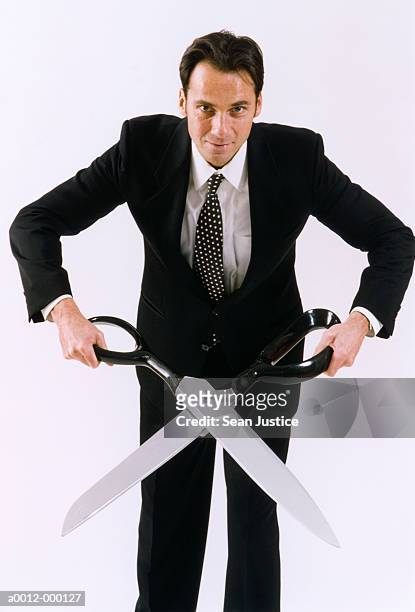 businessman with scissors - big head man stock pictures, royalty-free photos & images