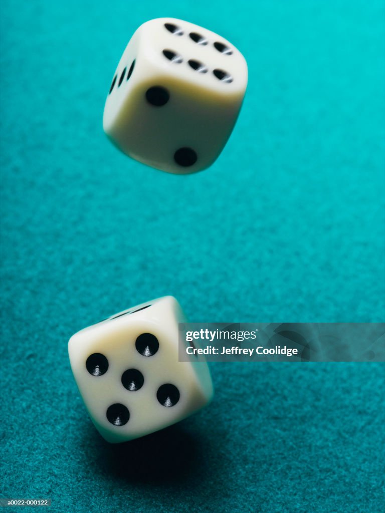 Pair Of Rolling Dice High Res Stock Photo Getty Images pair-of-rolling-dice-high-res-stock-photo-getty-images