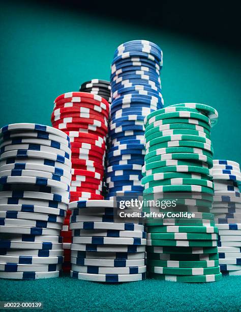 stacks of gambling chips - poker photos et images de collection