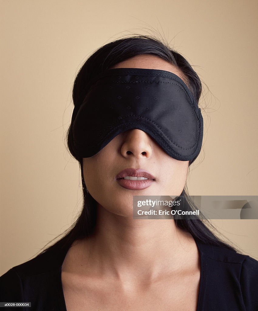 Woman Wearing A Blindfold High-Res Stock Photo - Getty Images