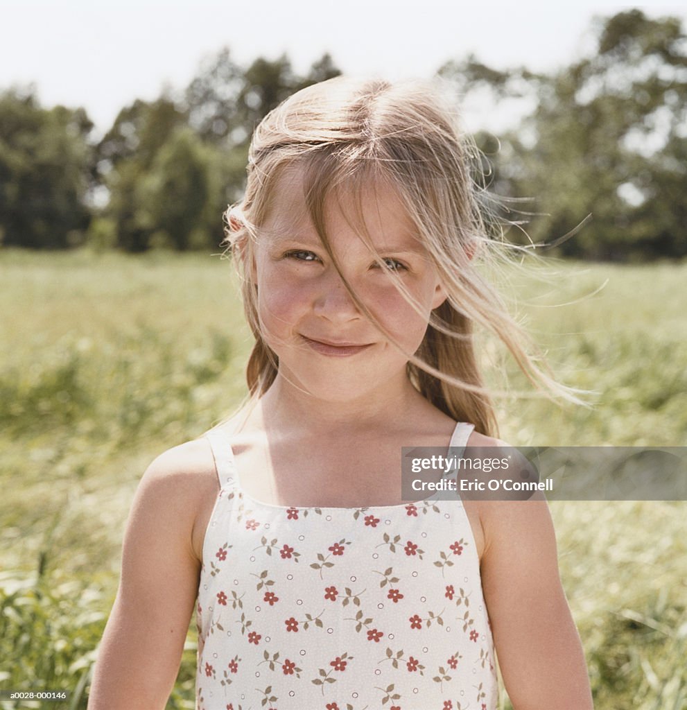 Smiling Girl in Field