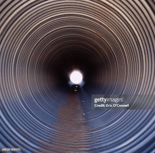 inside view of industrial pipe - oleodotto foto e immagini stock