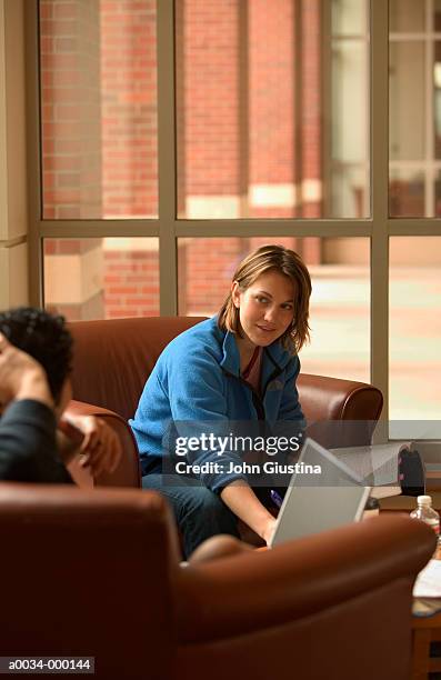 students in study lounge - common room stock pictures, royalty-free photos & images