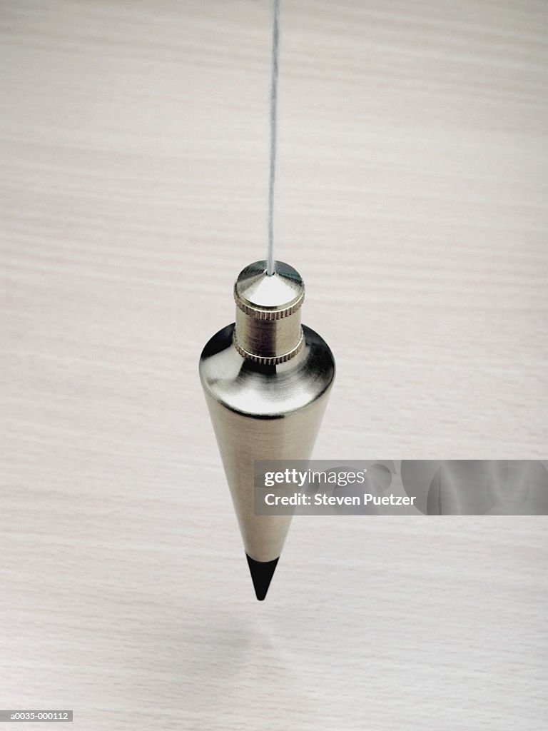 Weight String Plumb Weight Hanging On String High-Res Stock Photo - Getty Images