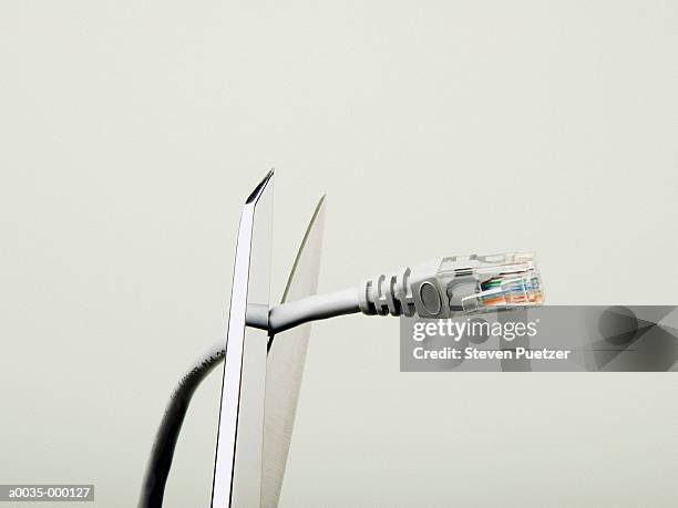 computer cable being cut - wire cut stockfoto's en -beelden