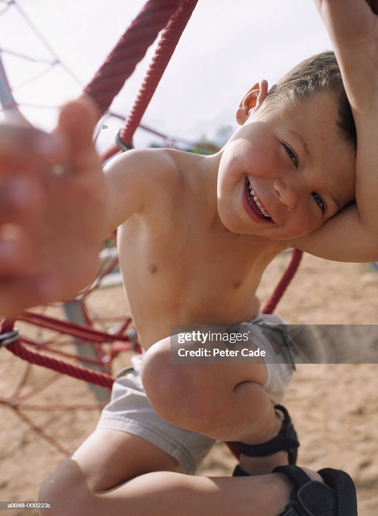 Boy on Jungle Gym