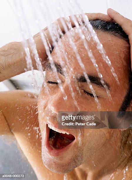 man washing in shower - man open mouth stock pictures, royalty-free photos & images