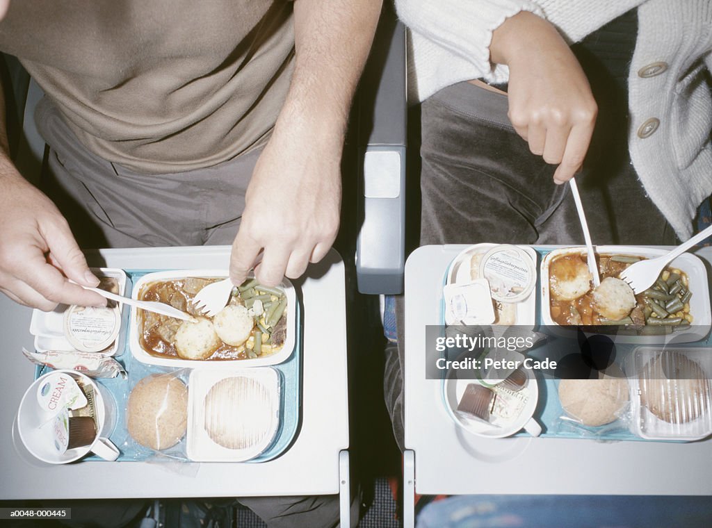 People Eating Airline Food