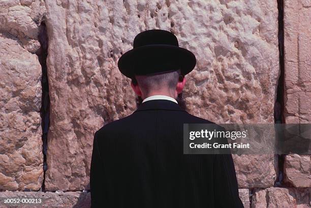 man at wailing wall - orthodox judaism stock pictures, royalty-free photos & images