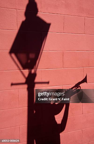 person playing trumpet - brass instrument stock pictures, royalty-free photos & images