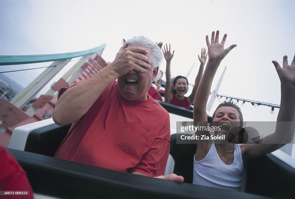 Man with Son on Rollercoaster
