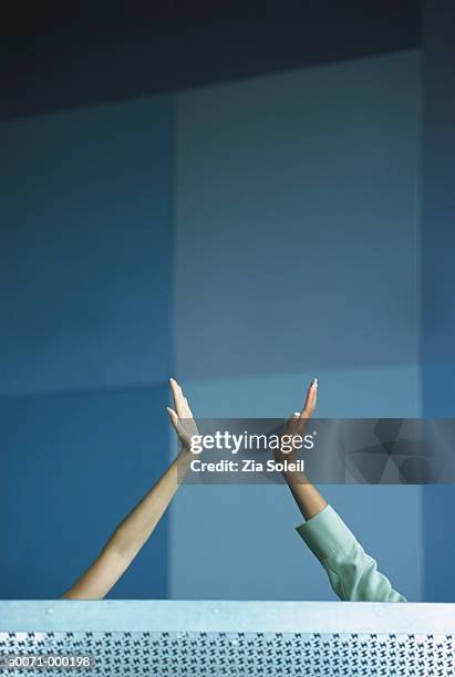 women giving high five - hi five stock pictures, royalty-free photos & images