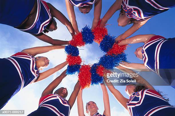 cheerleaders holding pom-poms - pompong bildbanksfoton och bilder