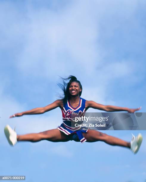 cheerleaders doing splits - black cheerleaders stock pictures, royalty-free photos & images