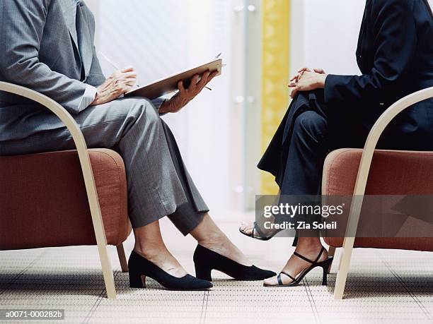 woman being interviewed - smart shoes stock pictures, royalty-free photos & images