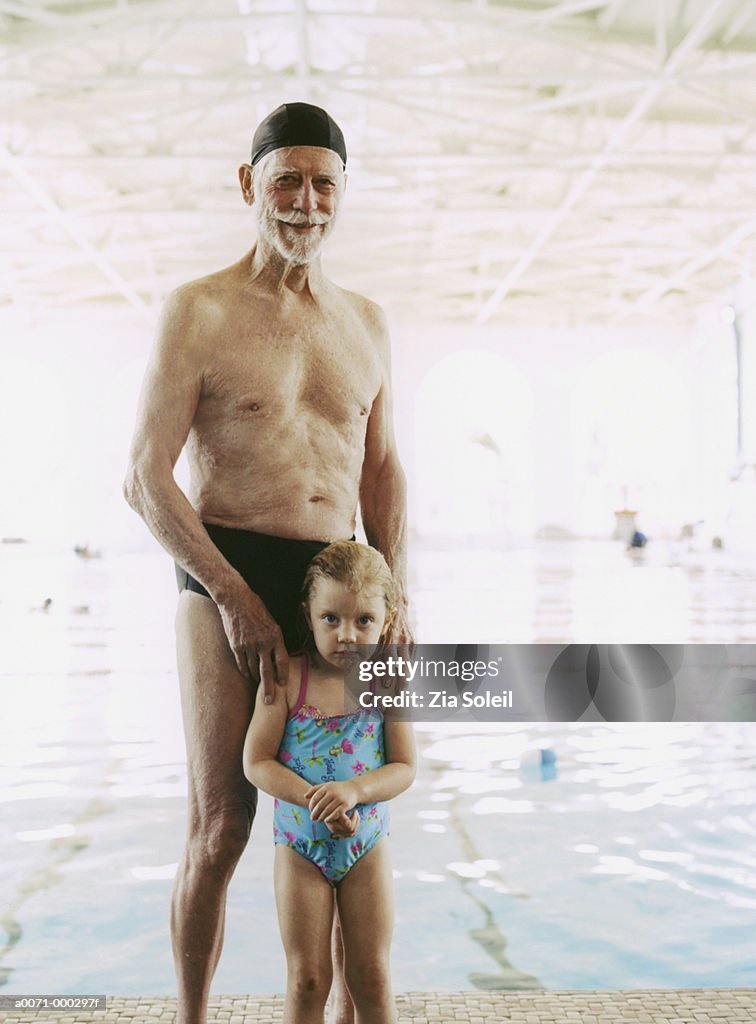 Girl and Grandfather by Pool