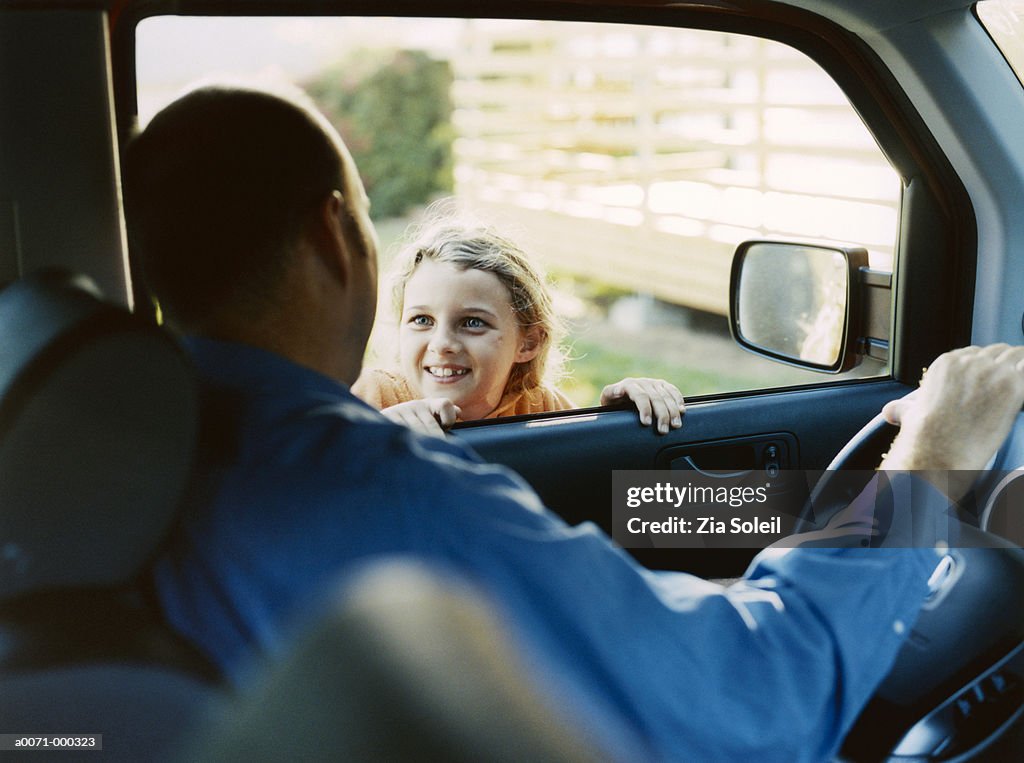 Girl Greeting Father in Car