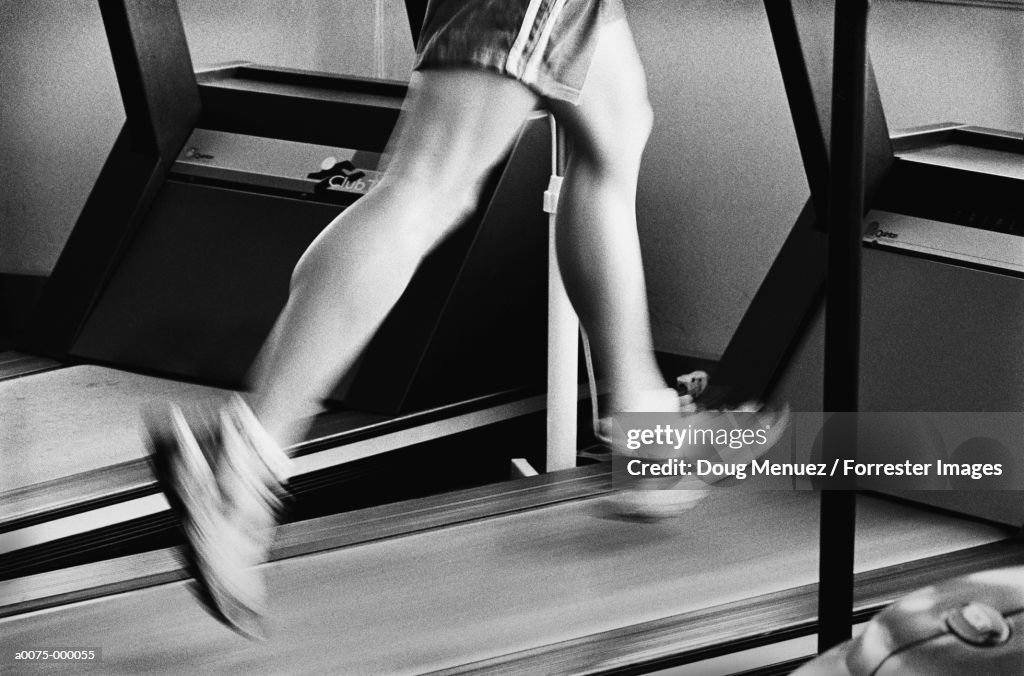 Legs Running on Treadmill