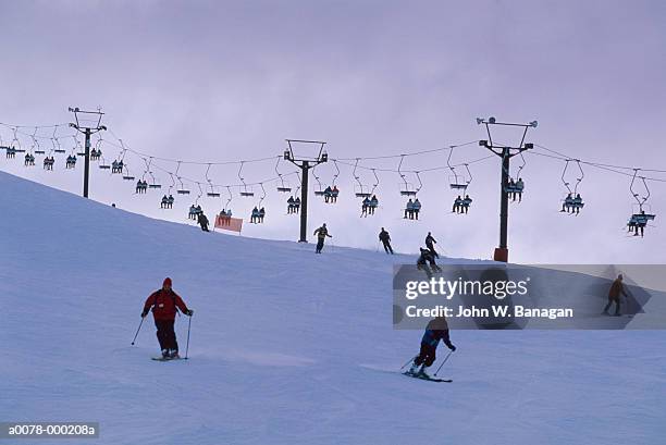 skiers and ski lift - ski new zealand stock pictures, royalty-free photos & images