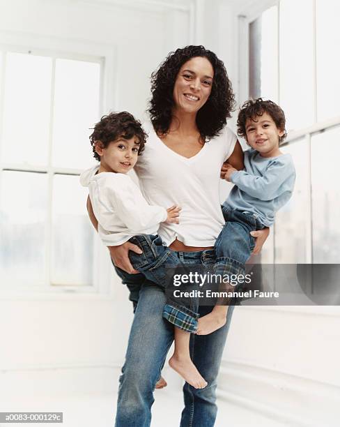 mother with twin boys - all dressed the same stock pictures, royalty-free photos & images